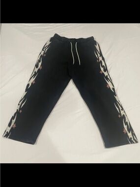 PacSun Black Elastic Waist super baggy sweatpants with fire design on sides